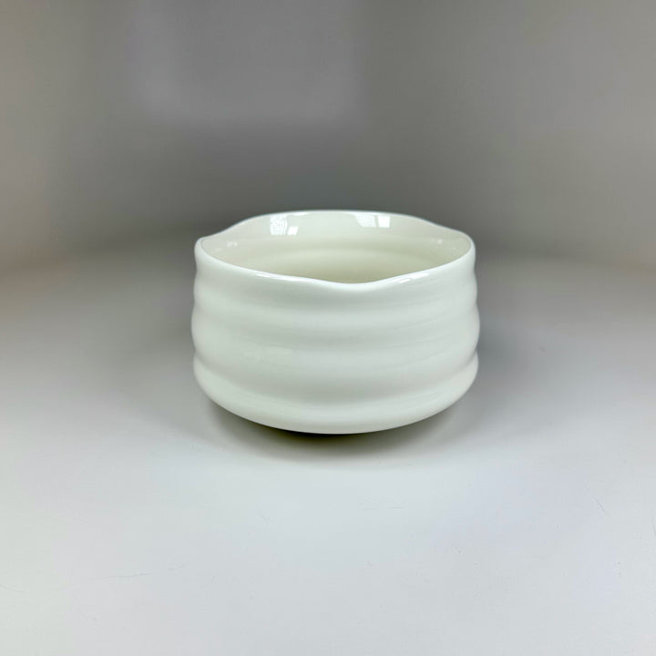 White ceramic chawan designed for traditional matcha.