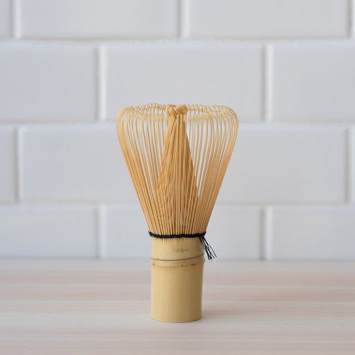 Handcrafted bamboo matcha whisk (chasen) used for frothing ceremonial matcha tea.